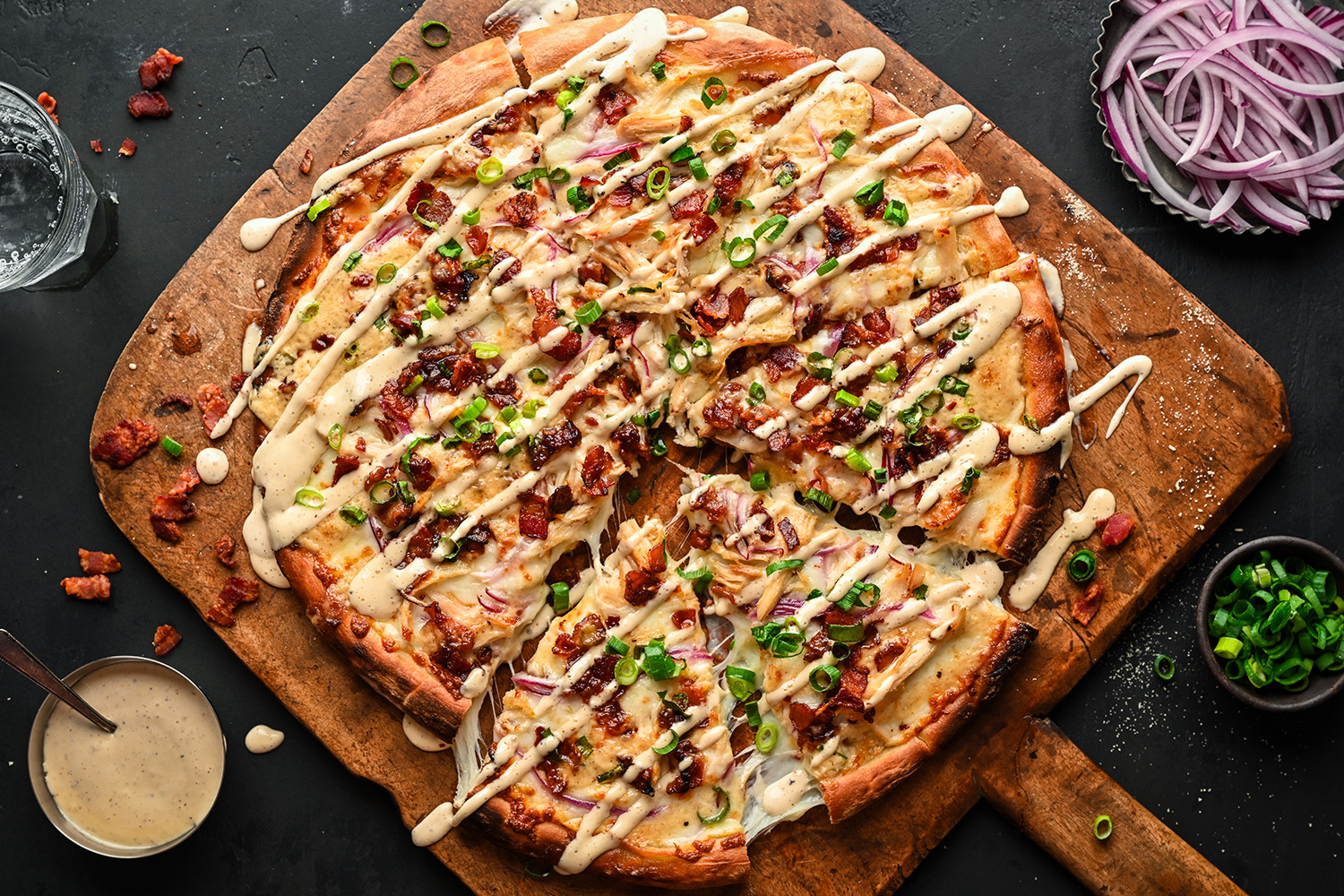 Chicken & Bacon Pizza recipe made with rotisserie chicken, bacon, and Flavortown Donkey Sauce